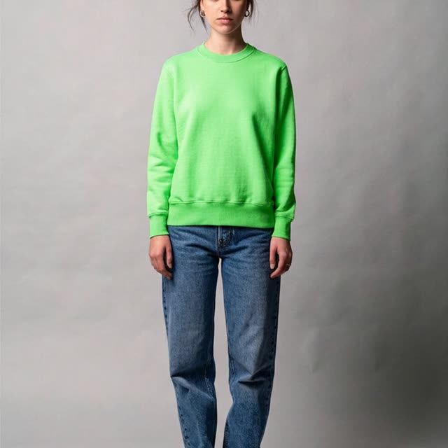 A sweater tried on a model from a flat product photo